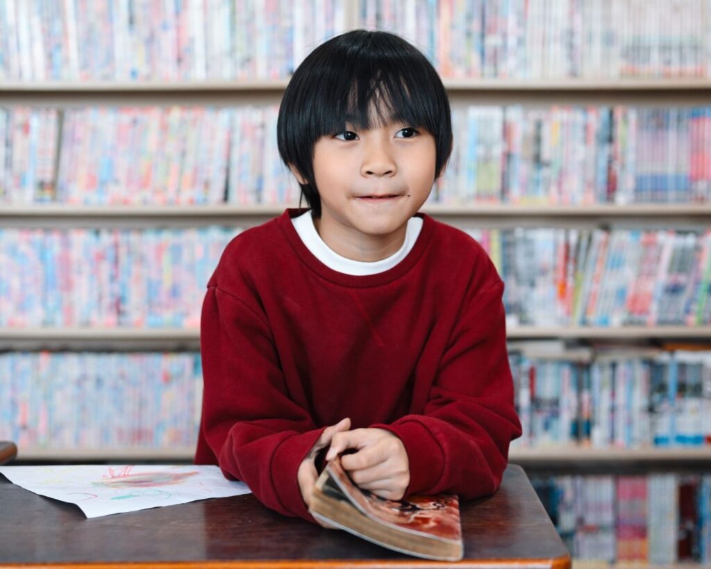 Boy at school book club