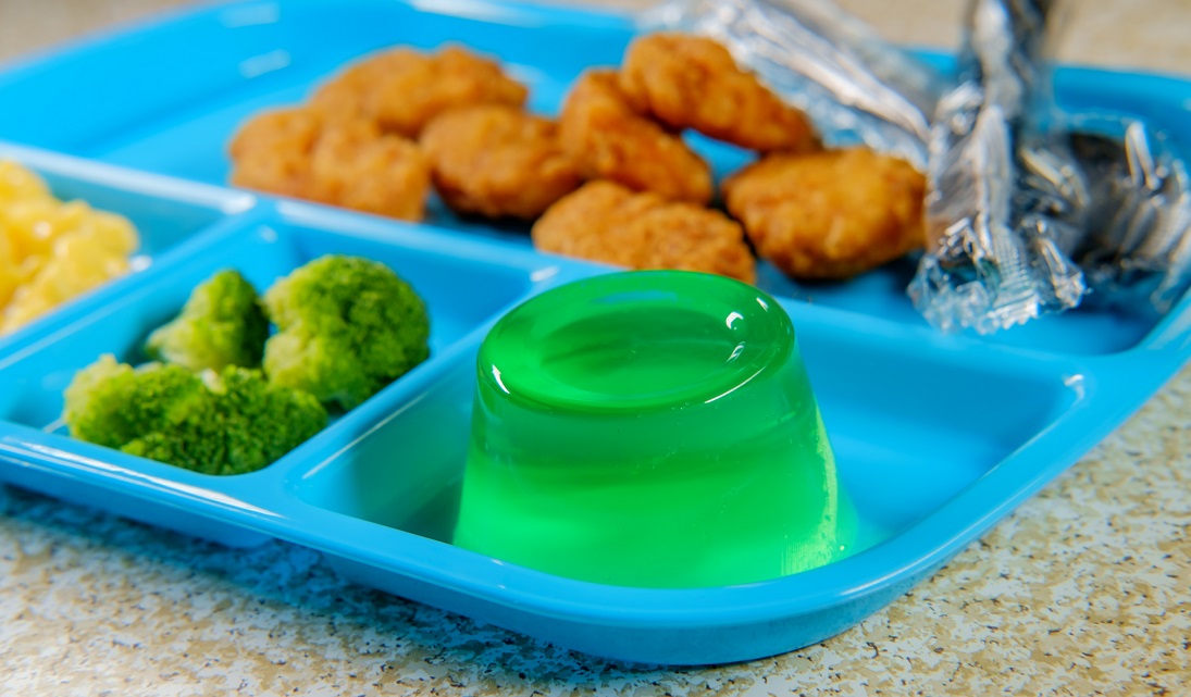 school lunch tray of chicken nuggets with broccoli