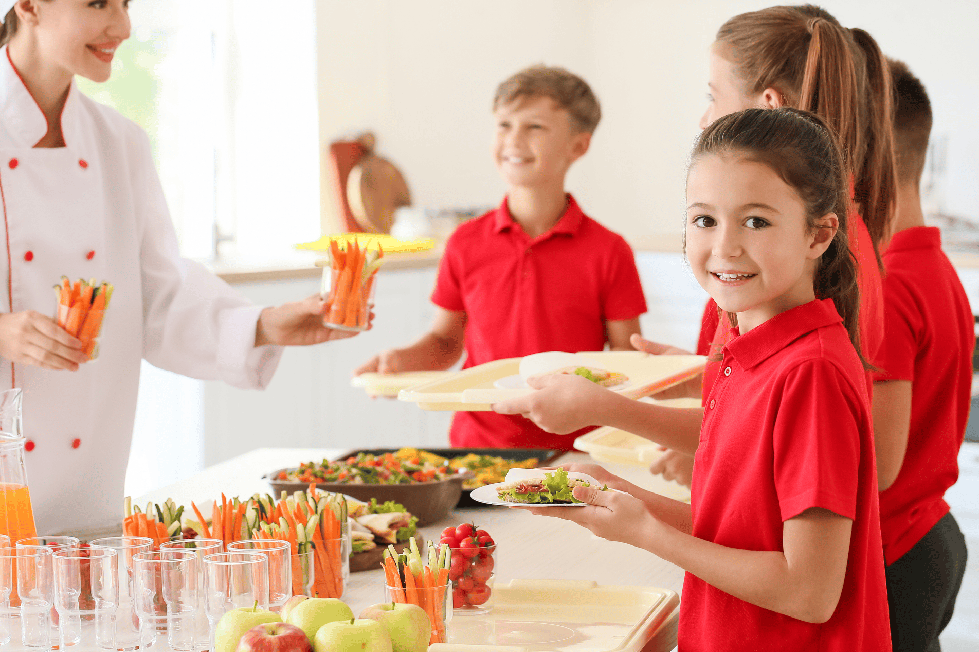 Children being served lunch in primary school