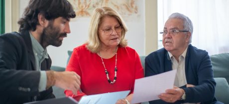 Local authorities three adults in a meeting
