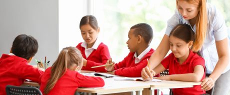 Teacher conducting lesson in classroom